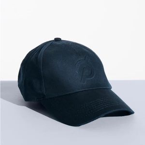 Navy embossed Peloton hat.